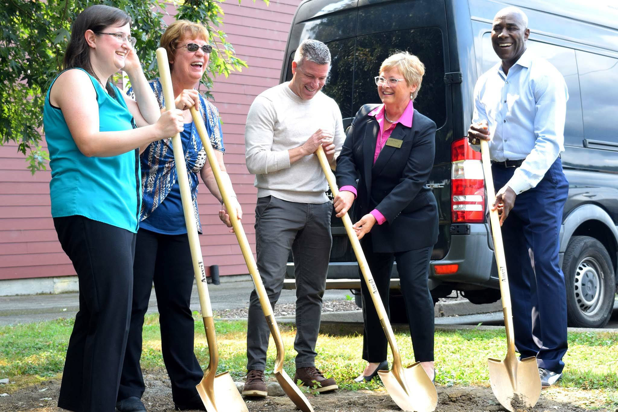 Sno-Valley Senior Center staffers and elected-officials celebrate the groundbreaking of new affordable senior apartments in Carnation on Aug. 23. From left: Center Executive Director Kira Avery, Director Emeritus Lisa Yeager, State Sen. Brad Hawkins, King County Councilmember Sarah Perry, Sound Generations CEO Jim Wigfall. Photo Conor Wilson/Valley Record.