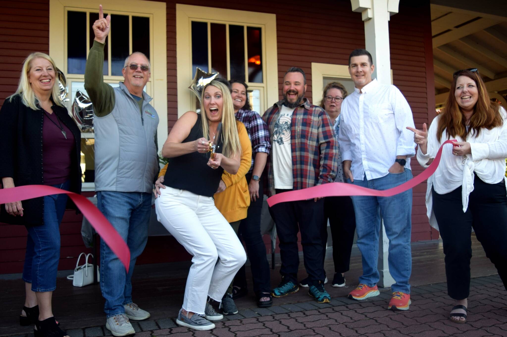 Photo by Conor Wilson/Valley Record
North Bend Downtown Foundation Board members celebrate the foundation’s new office at the North Bend Train Depot on Sept. 21. Pictured from left: Suzan Torguson, North Bend Mayor Rob McFarland, Foundation Executive Director Jessica Self, Britni Larson, Lucas Haines, Beth Burrows (back) Jason Glazier, SnoValley Chamber CEO Kelly Coughlin.