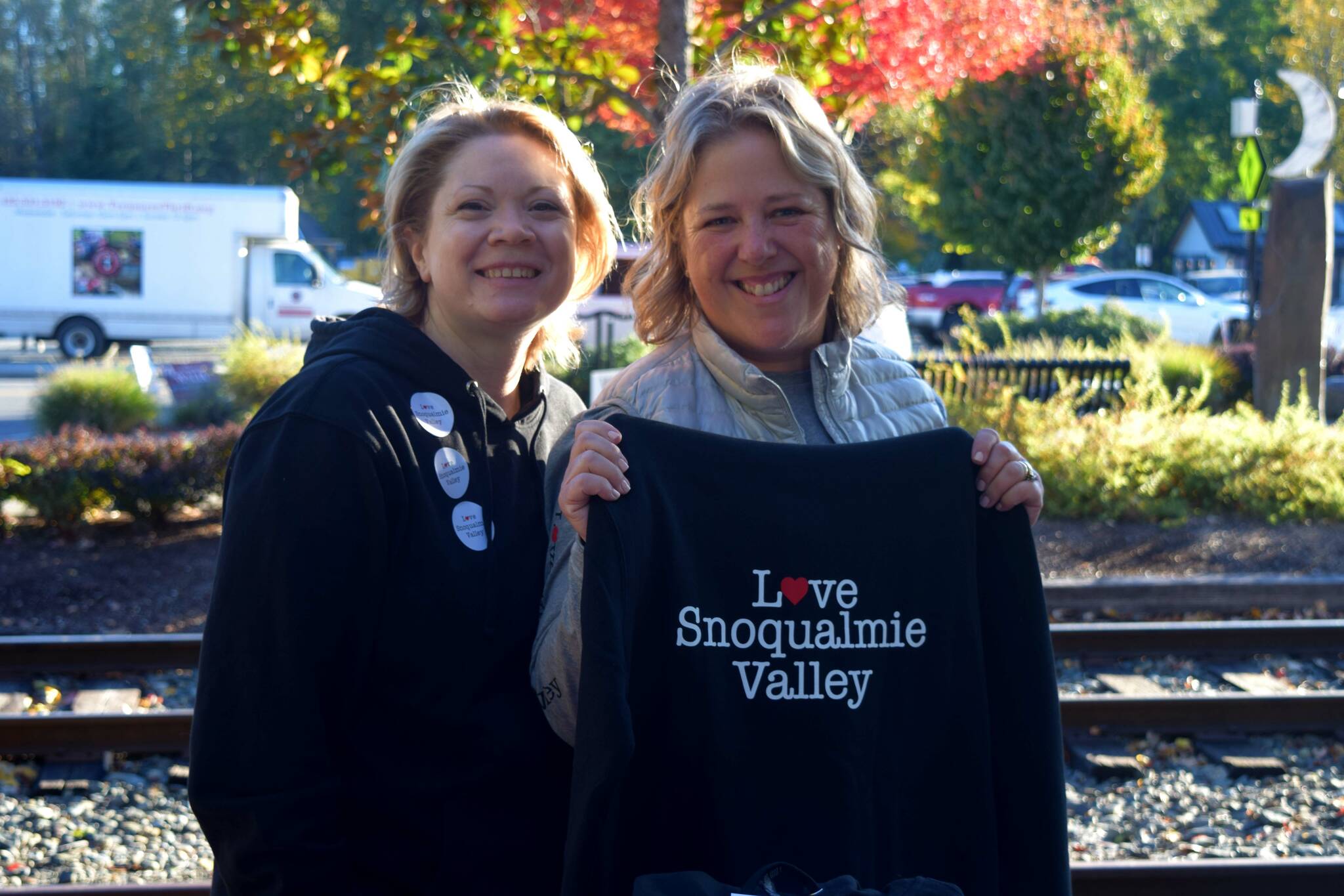 Photos by Conor Wilson/Valley Record
Snoqualmie Trading Co. Owners Heather Dean (left) and Cheri Buell sell Love Snoqualmie Valley merch at Volunteer Day. Half of the proceeds went back into the community, Dean said.