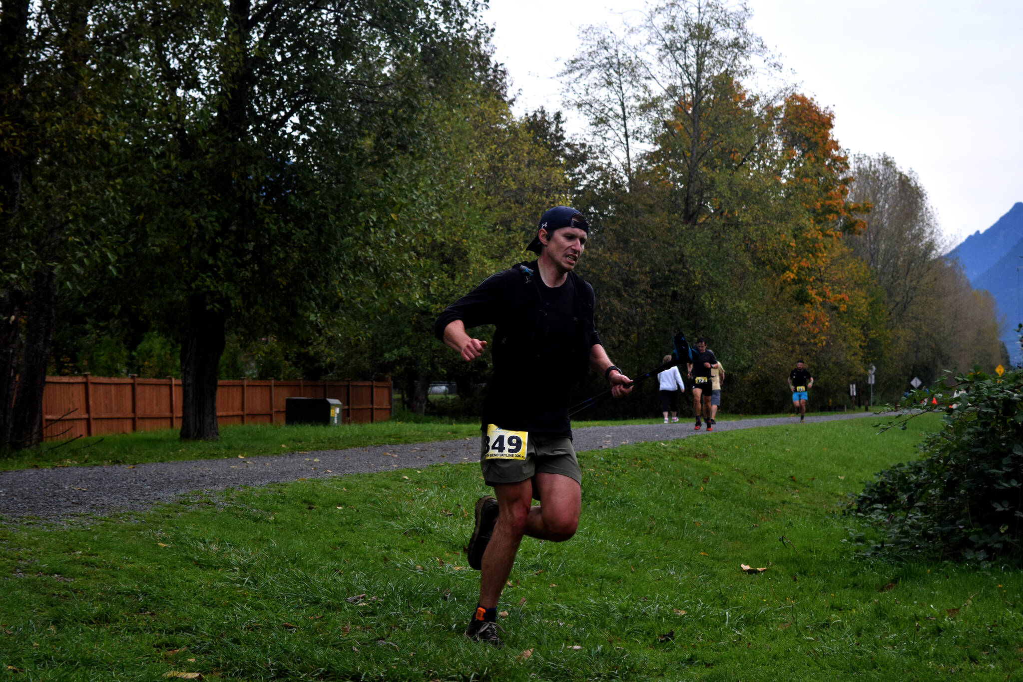 A runner on the Snoqualmie Valley Trail cuts towards the finish line at the Vert Running Series North Bend Skyline 30k on Oct. 14.