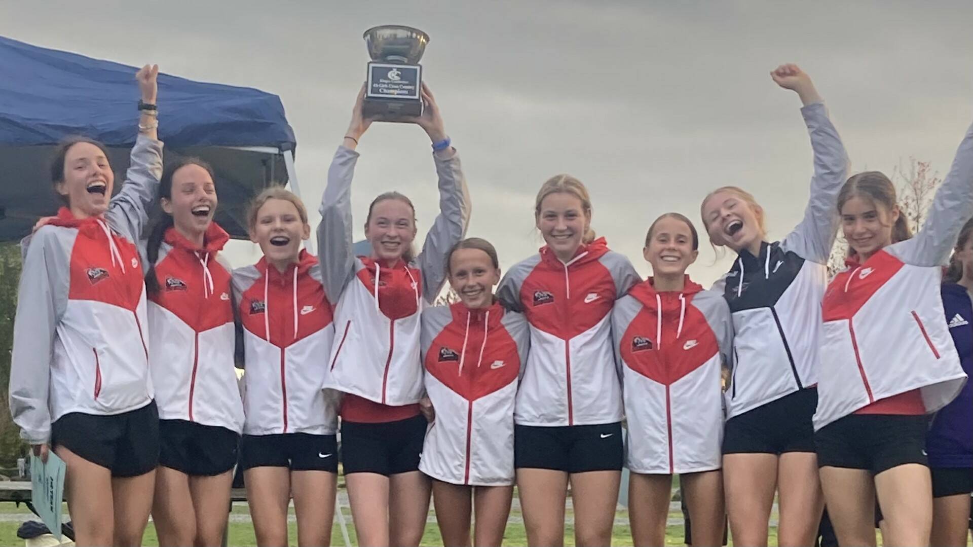 Courtesy photo
The Mount Si Girls Cross Country team hoists the KingCo Trophy.