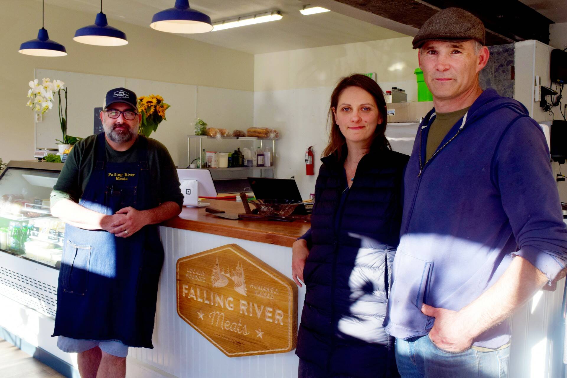 Photo Conor Wilson/Valley Record.
Darron and Christeena Mazolf (right), owners of Falling River Meats at 108 W. North Bend Way in North Bend, pose for a photo alongside Chef Justin Finch.