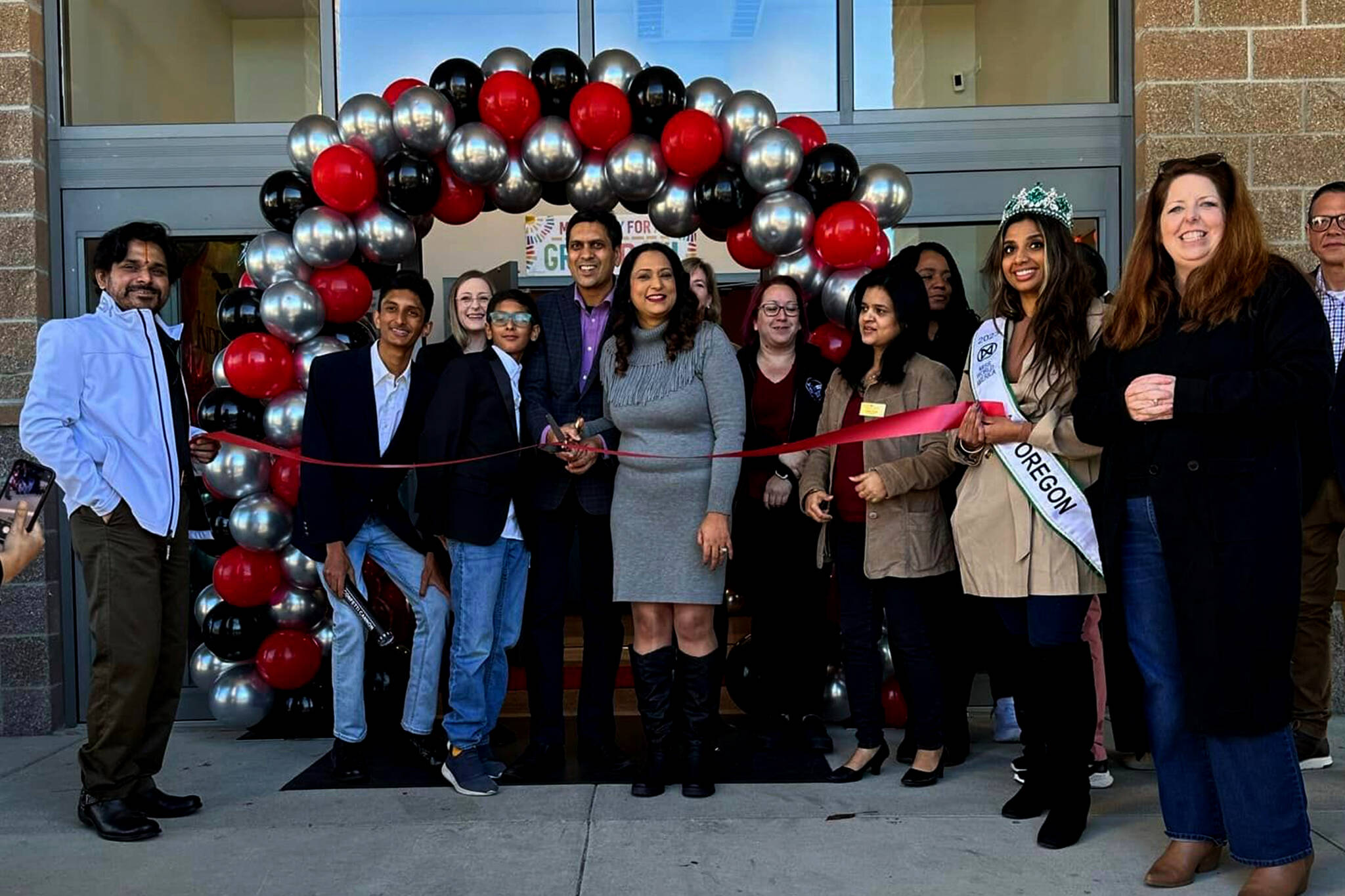 The Kiddie Academy of Snoqualmie celebrates its grand opening at 7730 Center Blvd. SE. The center was opened by Vasudha Sharma, a doctor, author and nonprofit CEO. Photo Courtesy of SnoValley Chamber of Commerce.