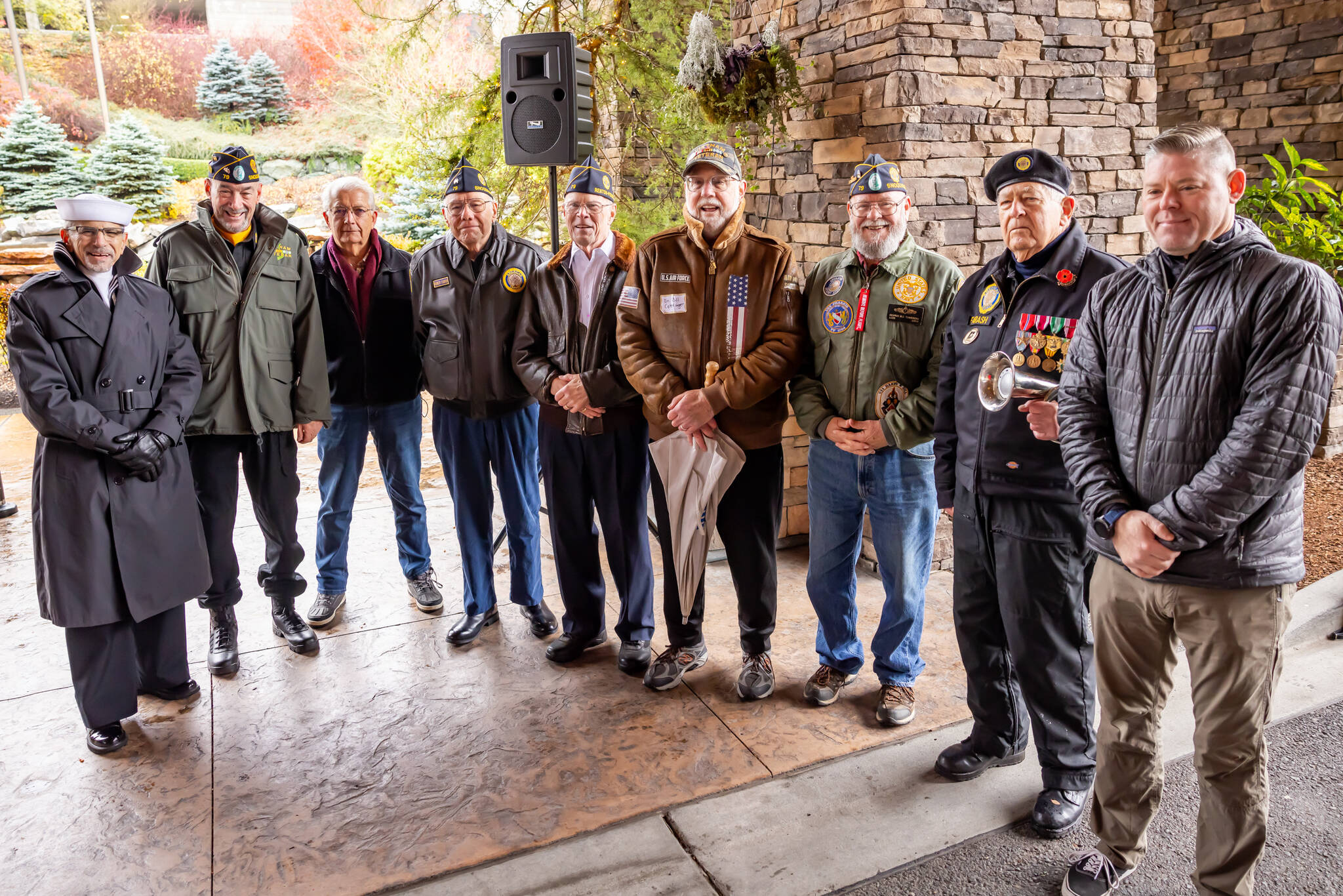 Veterans pose for a photo prior to a Veterans Day flag raising ceremony at the Snoqualmie Casino on Nov. 11. (Photo by David Conger / davidconger.com)