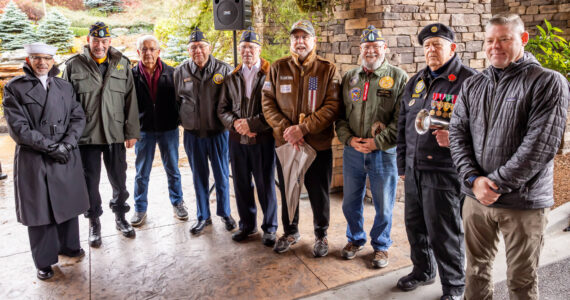 Veterans pose for a photo prior to a Veterans Day flag raising ceremony at the Snoqualmie Casino on Nov. 11. (Photo by David Conger / davidconger.com)