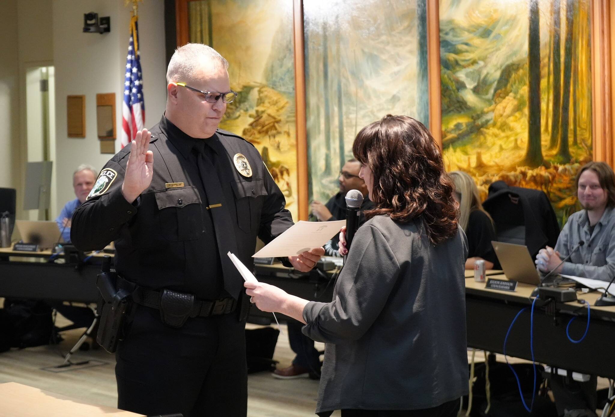 Photo courtesy of the city of Snoqualmie.
Snoqualmie Police Chief Brian Lynch takes his oath of office alongside city clerk Deana Dean at city hall on Nov. 27.