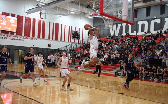 Photo Courtesy of Calder Productions. Mount Si Sophomore Lattimore Ford goes for a dunk in the Wildcats season opener against Issaquah on Dec. 4.