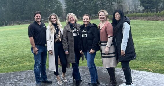 From left: Matt Childs representing nominator Sarai Childs, Svea Lien, Cheri Buell, Tess Linder, Julie Chung and Heather Dean who are the other two owners of Snoqualmie Trading Company. (Cameron Sires/Sound Publishing)