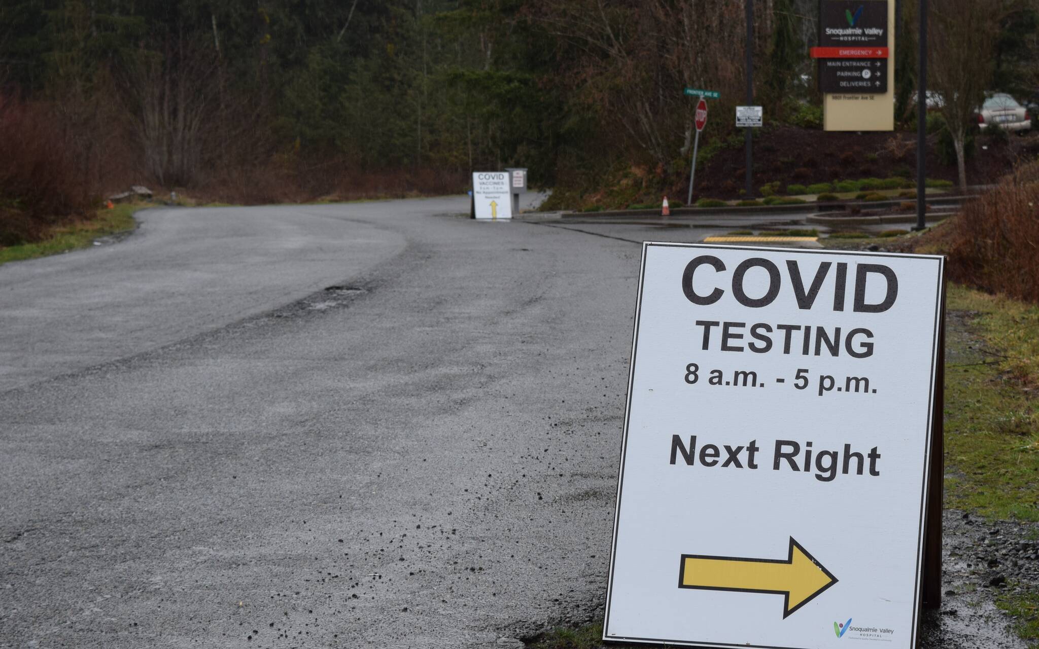 File photo: A COVID-19 testing sign outside Snoqualmie Valley Hospital in 2022.