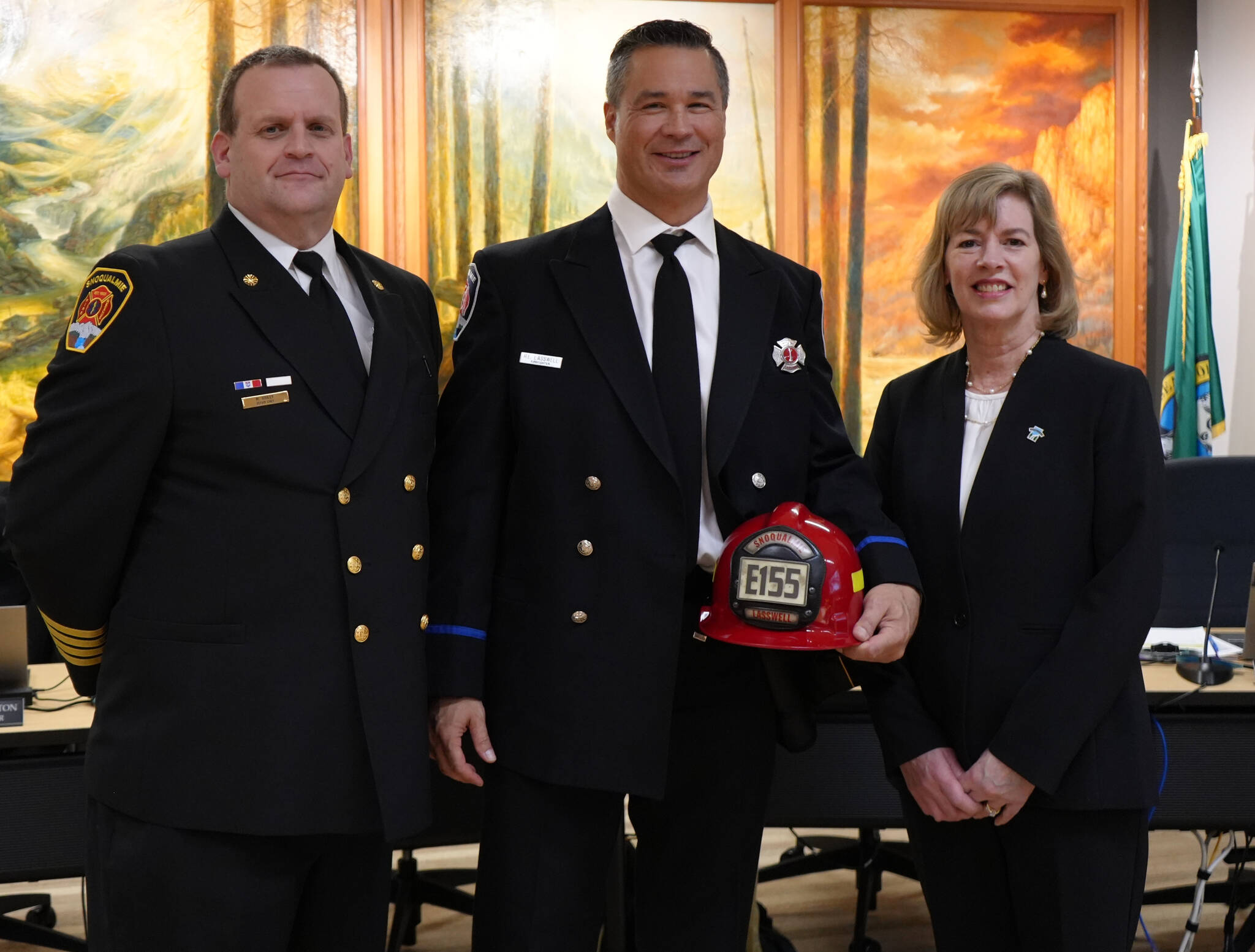 Fire Chief Mike Bailey (left), Lieutenant Robert Lasswell (middle) and Mayor Katherine Ross (right) at the Monday meeting of the Snoqualmie City Council. Photo courtesy of the Snoqualmie City Council