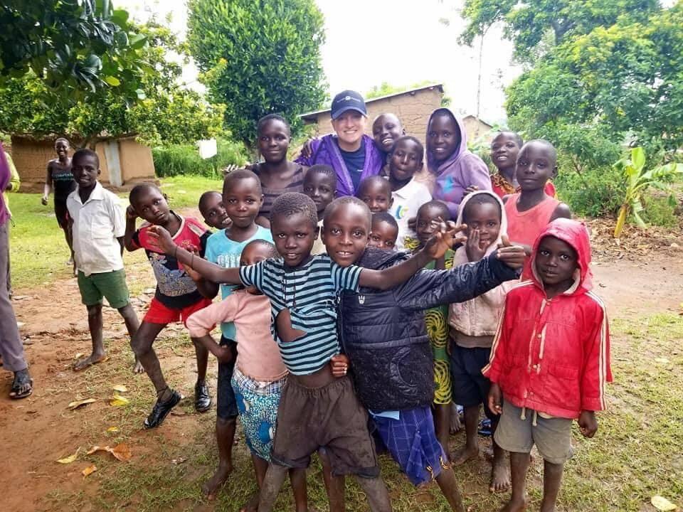Photo courtesy of Lena Baunsgard
Lena Baunsgard poses for a photo with Ugandan children during a recent trip to the region.
