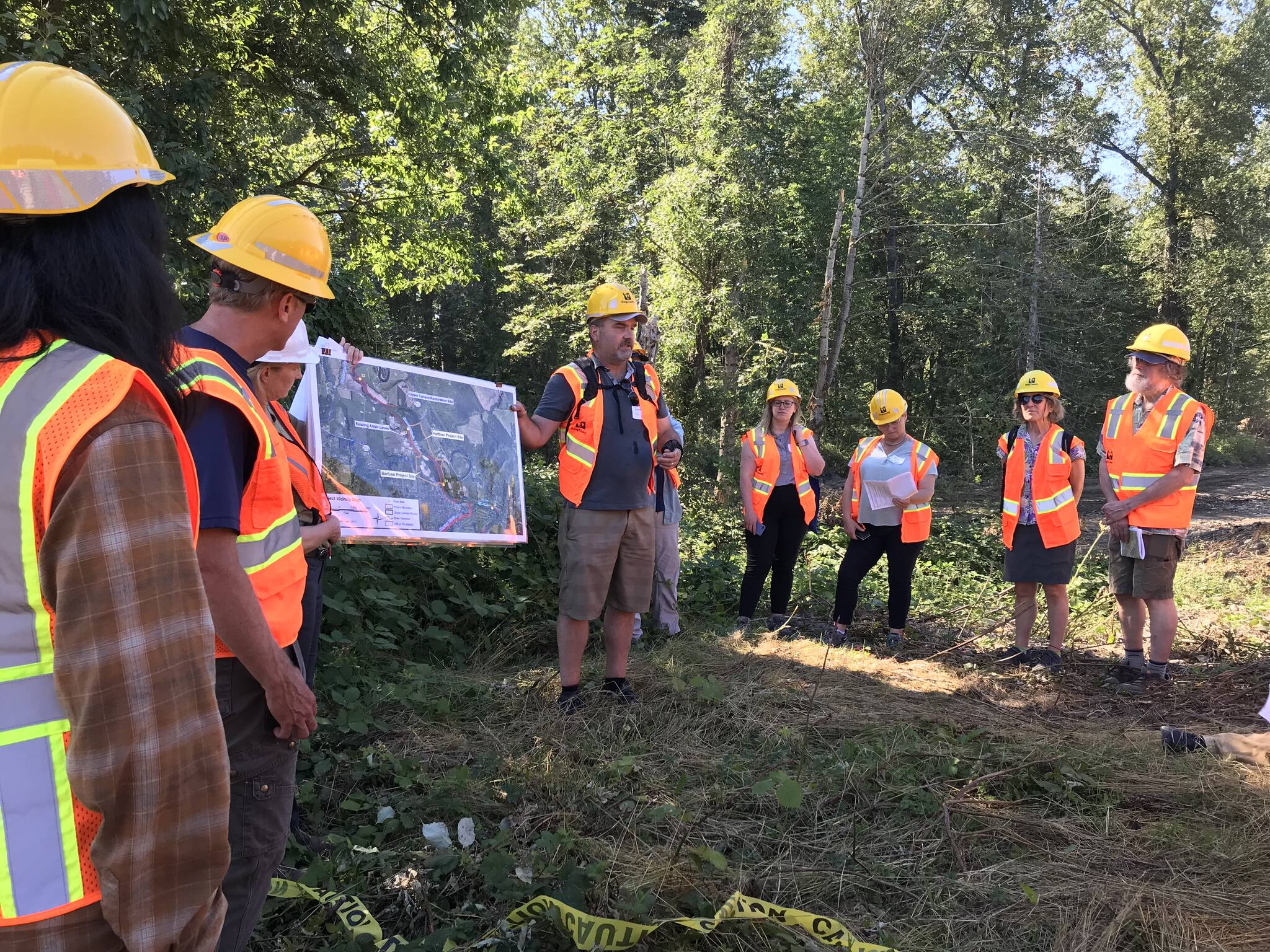 (Photo courtesy of Elissa Ostergaard)
Forum members leading a tour of the Fall City Floodplain Restoration Project in 2022.