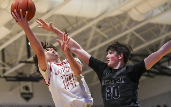 Mount Si’s Marcus Heide (14) shoots the ball during a boys Class 4A bi-district title game between Glacier Peak and Mount Si at North Creek High School on Friday, Feb. 16, 2024 in Bothell, Washington. The Wildcats won, 59-53.(Annie Barker / The Herald)