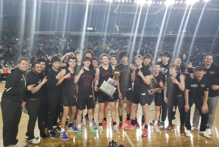 <p>The Wildcats celebrate March 2 at the Tacoma Dome after winning the 4A state basketball championship. Courtesy photo</p>