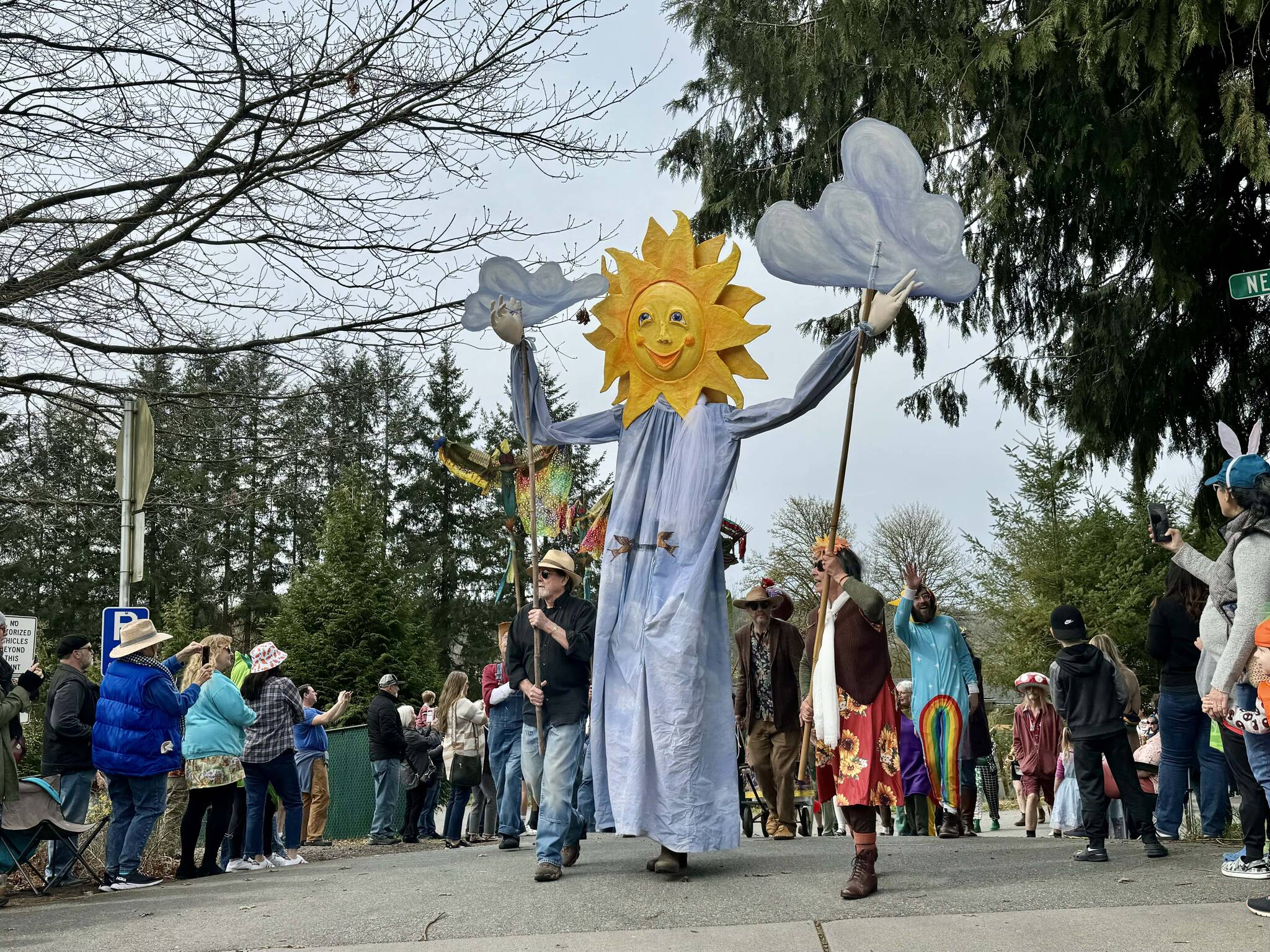 A large, smiling sunflower puppet welcomes a crowd at Depot Park on Saturday, March 30. Photos by Grace Gorenflo/For the Valley Record