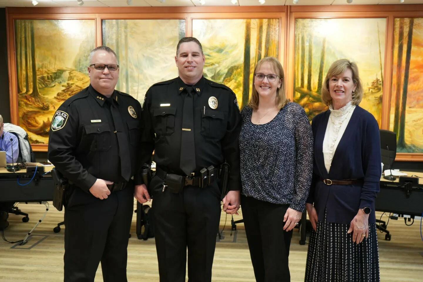 Chief Brian Lynch (left), Captain Gary Horejsi, his wife and Snoqualmie Mayor Katherine Ross (right). Photo courtesy of the City of Snoqualmie