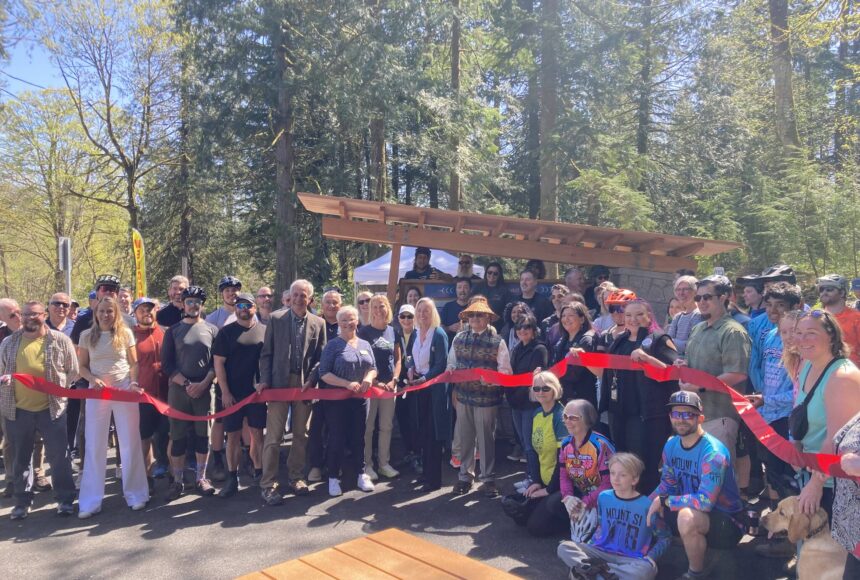 <p>North Bend Mayor Mary Miller cut the ribbon at Tennant Trailhead Park on April 19. (Photo by Mallory Kruml/Valley Record)</p>