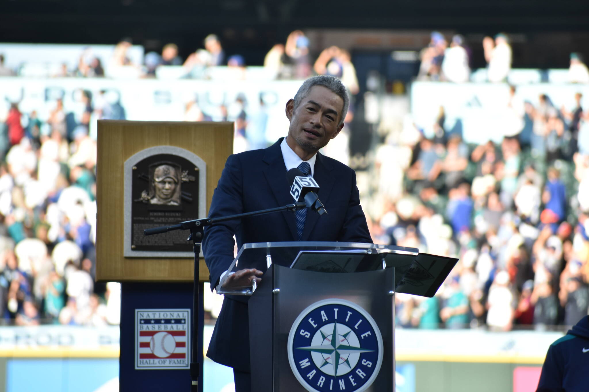 Ichiro takes the podium during his number retirement ceremony. Ben Ray / Sound Publishing