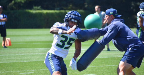 Alphonzo Tuputala, an alum of Federal Way High School and University of Washington, works on a drill during his first day at Seahawks training camp. Ben Ray / Sound Publishing