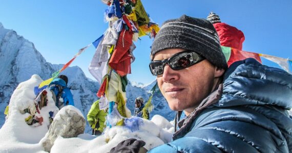 Brian Dickinson, author of “Bloodline of Redemption,” atop Mount Everest in 2011. Photo courtesy of Brian Dickinson