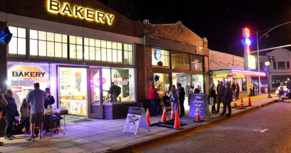 Night falls on the busy North Bend Way during the annual North Bend Blues Walk. File photo