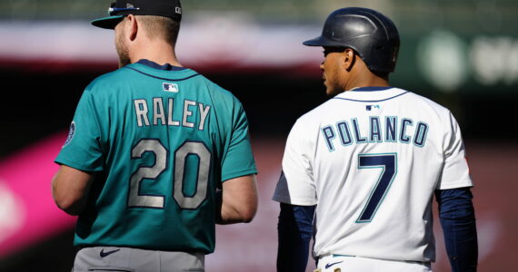 Luke Raley and Jorge Polanco stand beside each other during the scrimmage at T-Mobile Park. Photo credit Ben VanHouten/Seattle Mariners
