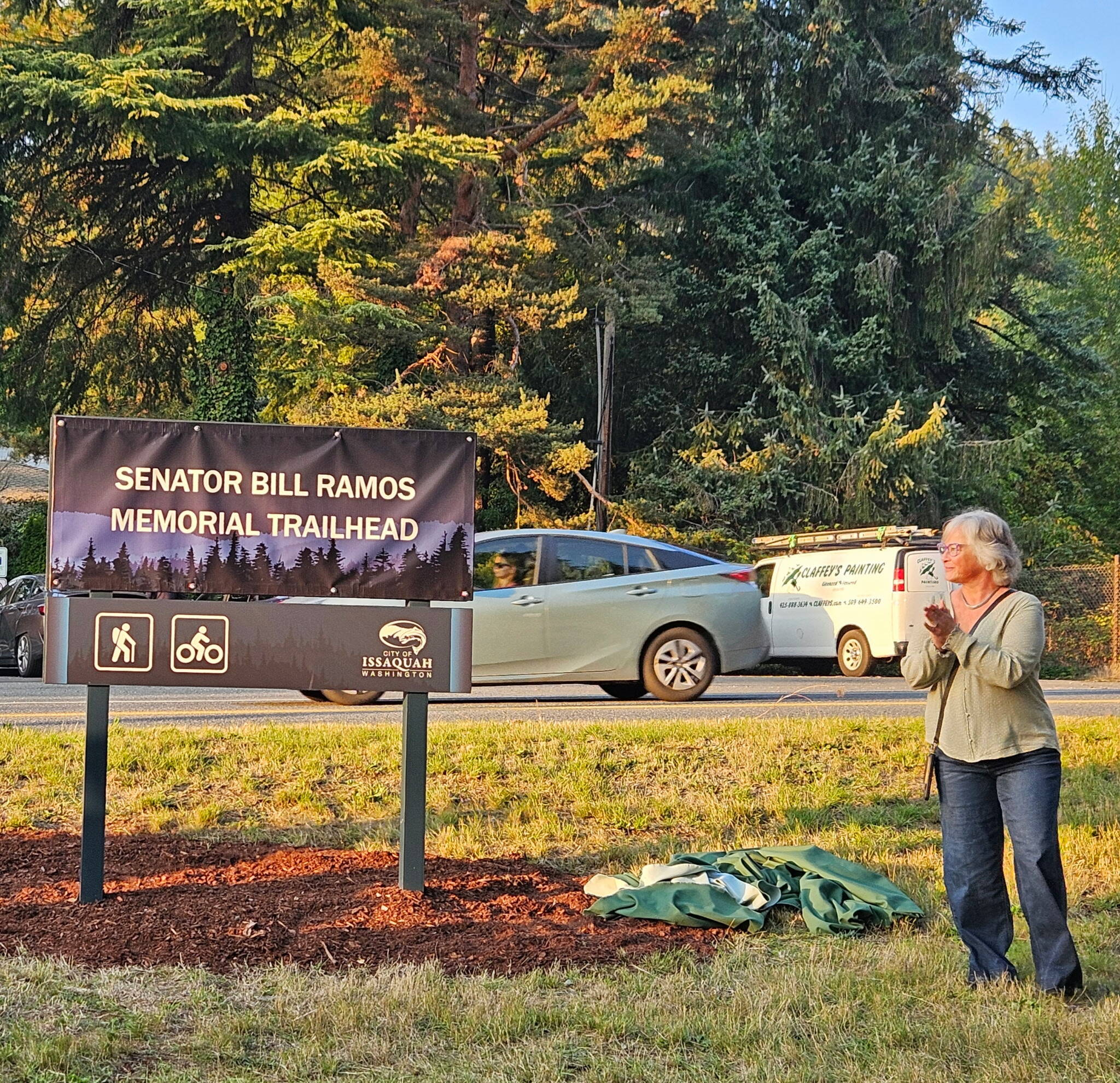 King County Councilmember Sarah Perry unveils the new Issaquah trailhead marker named after her late husband Sen. Bill Ramos, Oct. 6, 2025. Photo courtesy of Sarah Perry