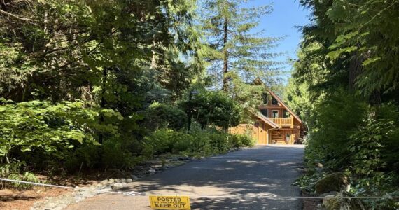 The Lake Alice home of the Humiston family has a no trespassing sign posted at the end of the driveway, July 11, 2025. (Grace Gorenflo/Valley Record)