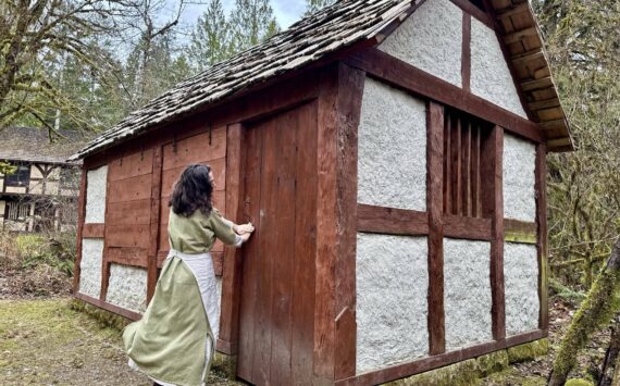 Camlann Medieval Village Executive Director Lauren Poyer shows a cottage at Camlann, March 9, 2025. Photo by Grace Gorenflo/Valley Record