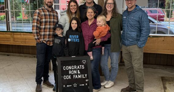 Ron Cox with his wife, KC, and his two sons, Michael and Stephen, and their families (minus one grandson). Photo courtesy of Sara Cox