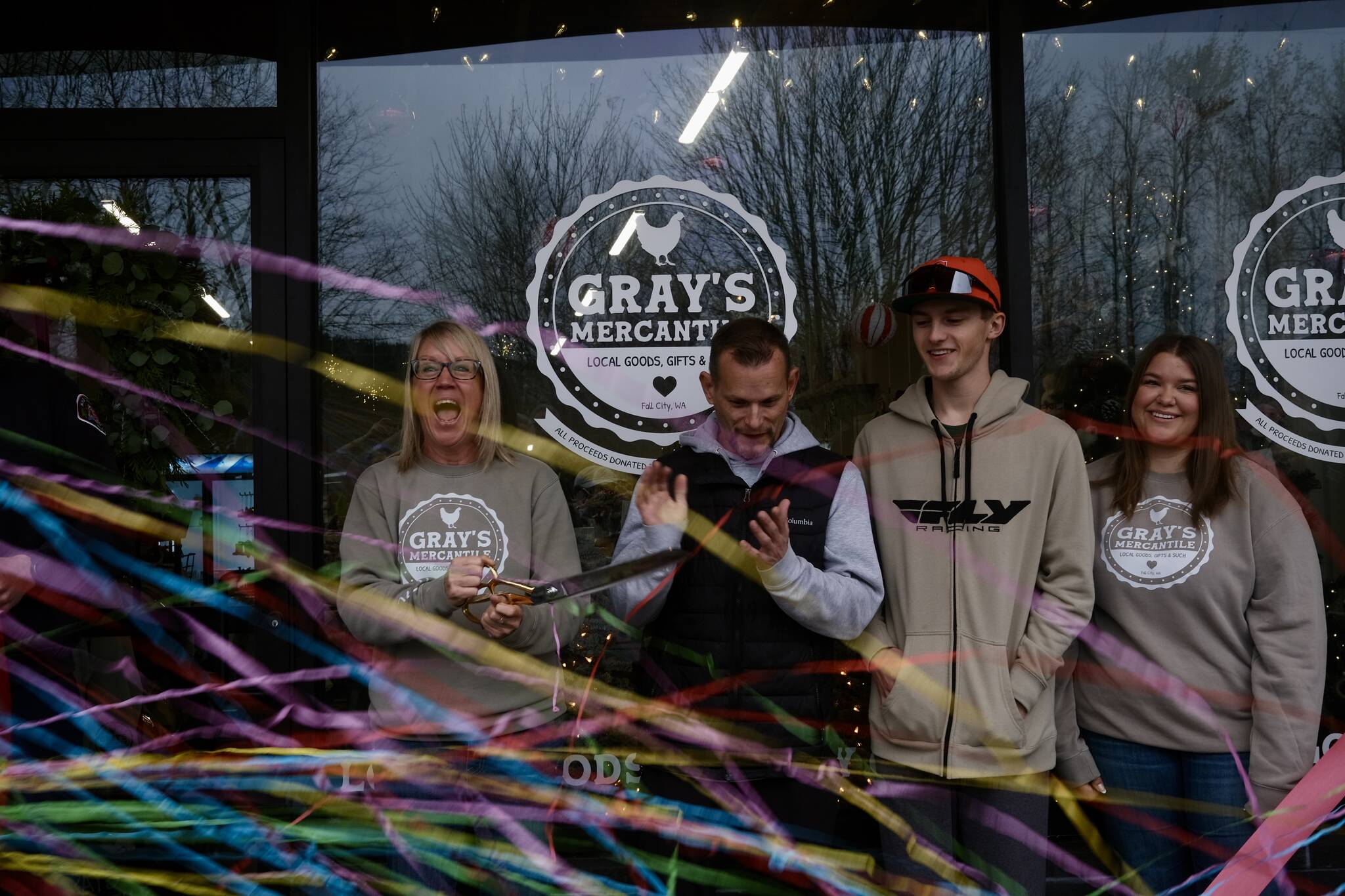 The Stumpf family celebrates after Grays Mercantile founder Summer Stumpf cuts the ribbon, Nov. 15, 2025. (Grace Gorenflo/Valley Record)