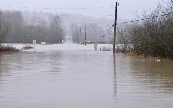 NE 124th Street, one of the two roads that takes Duvall residents across the river and quickly out of the Snoqualmie Valley, is closed due to flood water, Dec. 10, 2025. (Grace Gorenflo/Valley Record)