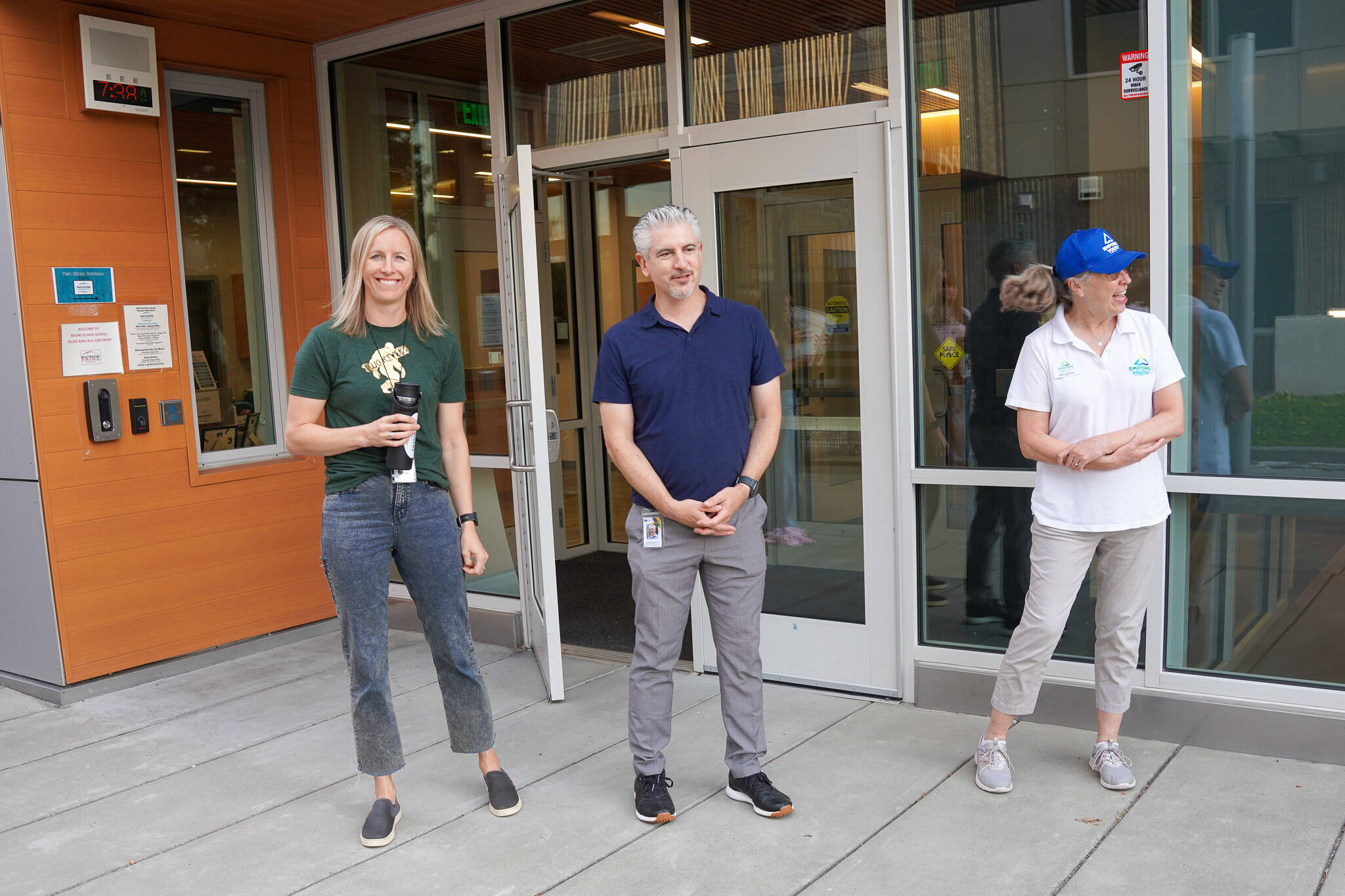 Photo courtesy of the Snoqualmie Valley School District 
Two Rivers staff, including Principal Catherine Fredenburg (left), greet students on the first day of the 2025-26 school year.