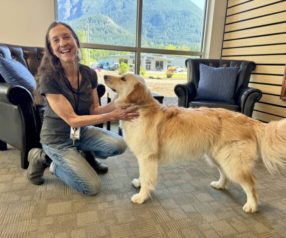 <p>North Bend&rsquo;s Administrative Services Director Lisa Escobar with her dog, Harley, at North Bend City Hall, May 2, 2025. Grace Gorenflo/Valley Record</p>