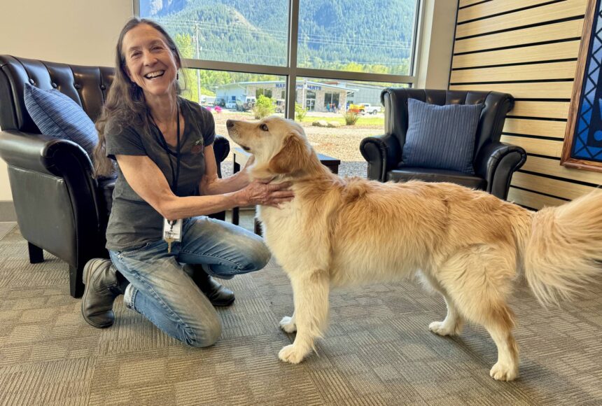 <p>North Bend&rsquo;s Administrative Services Director Lisa Escobar with her dog, Harley, at North Bend City Hall, May 2, 2025. Grace Gorenflo/Valley Record</p>