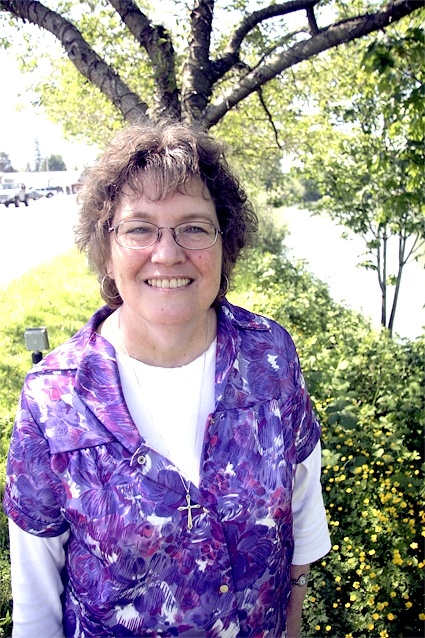 Dedicated volunteer and Fall City Cuts barber Brenda Carignan is the 2009 Fall City Days parade grand marshal. She's loved parades since