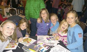 Adventure Guide participants helping to decorate Thanksgiving boxes