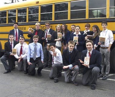 Members of Cedarcrest High School’s Technology Student Association show off their winning trophies at the state conference this spring in Bellevue.