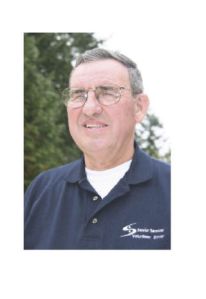 Longtime log trucker David Kelley now volunteers to drive senior citizens to medical appointments and on excursions. He also provides communion to homebound parishioners.