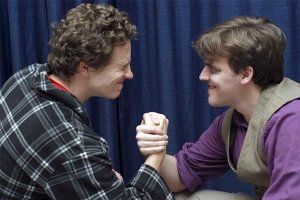 David Hebert as Neville and Dylan Cook as Wormskull shake on a deal in a scene from 'Neville vs. the Demon