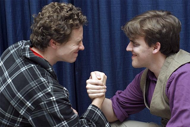 David Hebert as Neville and Dylan Cook as Wormskull shake on a deal in a scene from 'Neville vs. the Demon