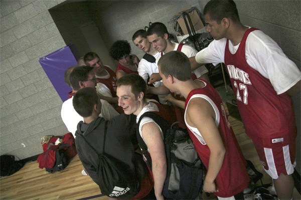 Members of Mount Si High School's boys basketball contingent to the Kang Classic celebrated their upset of Kentwood in round three of weekend play in Kirkland. The nascent team came from 10 behind for the win on Sunday