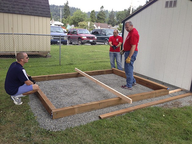 Eastside firefighters build shed for Carnation's senior thrift store
