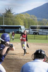 Wildcat pitcher Alex Johnson throws to Jessica Bladow of Seattle Prep during play Thursday