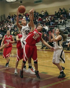 Junior Hailey Eddings battles for the ball with Eastlake's Alyssa Charleston during play Friday