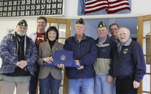 Carnation gets Centennial flag from Congresswoman Suzan DelBene