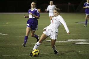 Mount Si midfielder Karlie Hurley hustles the ball against  Issaquah in October.