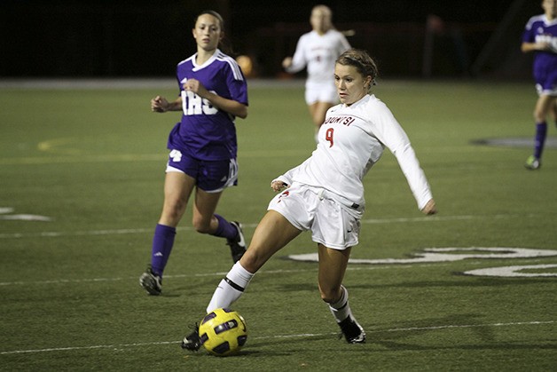 Mount Si midfielder Karlie Hurley hustles the ball against  Issaquah in October.