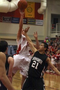 Mount Si High School’s Ryan Atkinson leaps for the hoop during play Friday