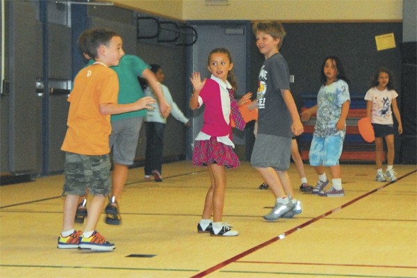 Carnation Elementary students “freeze” after they’ve been tagged in PE class